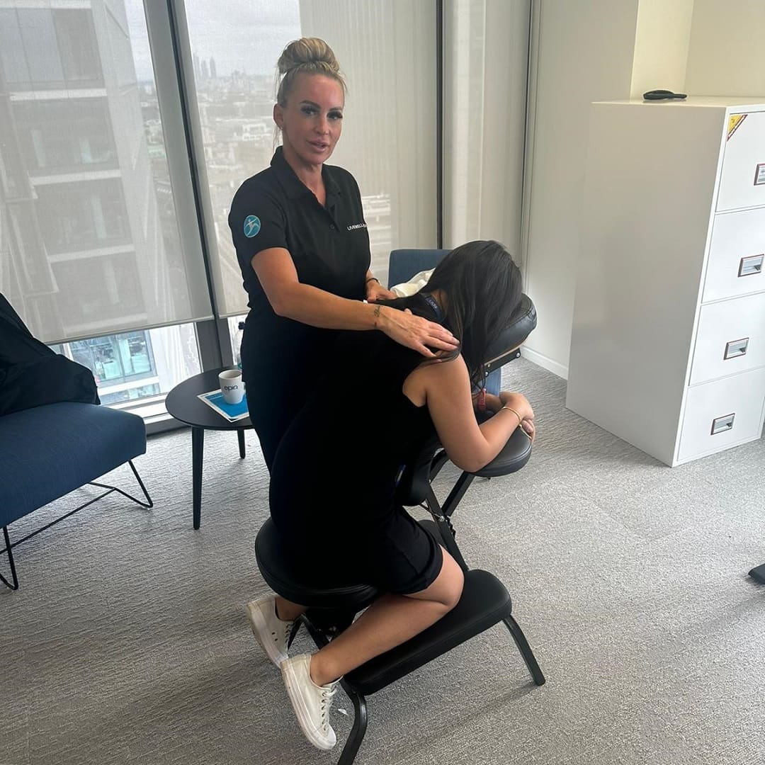 epiq corporate wellbeing day event with onsite chair massage services. Office massage in Manchester, Birmingham, London