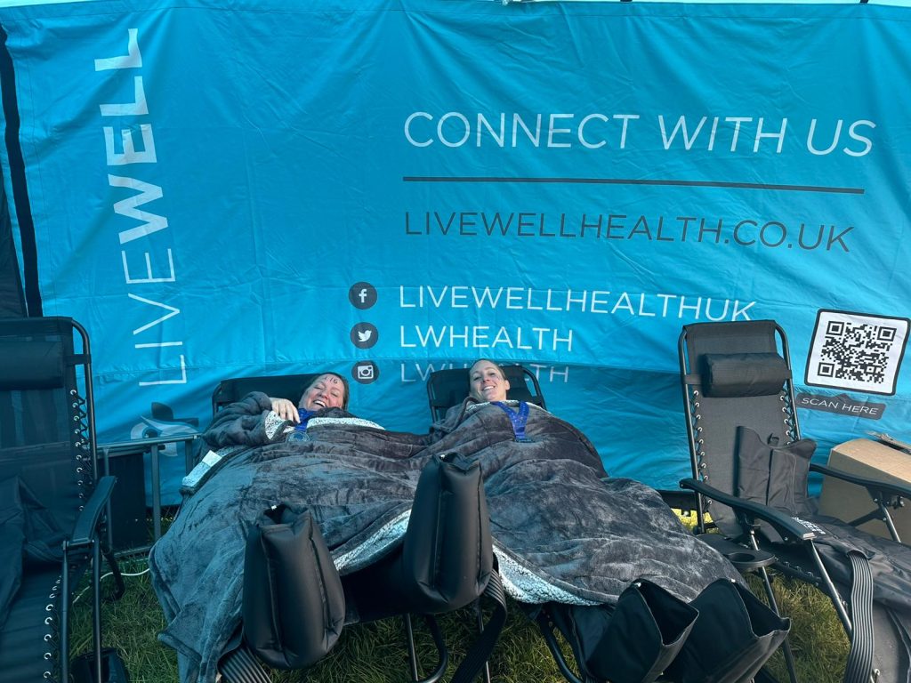 two ladies all warmed up enjoying the compression boot therapy