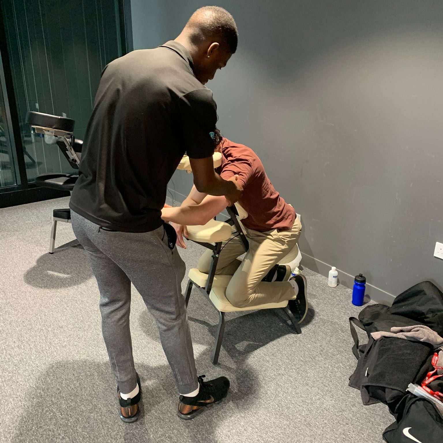 Leon performing office on site massage