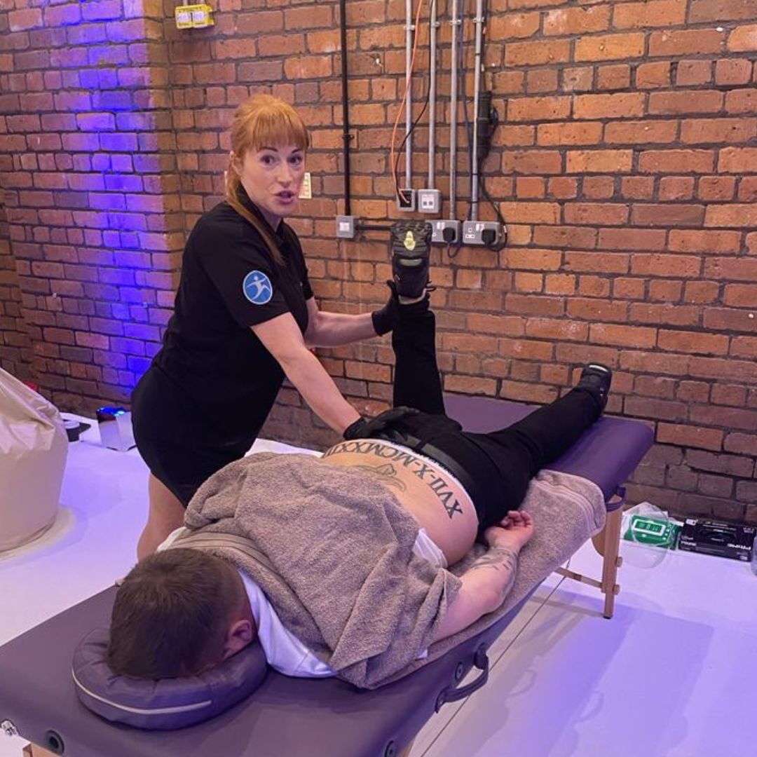 Livewell therapist providing advanced sports massage techniques such as STR, MET and Positional Release